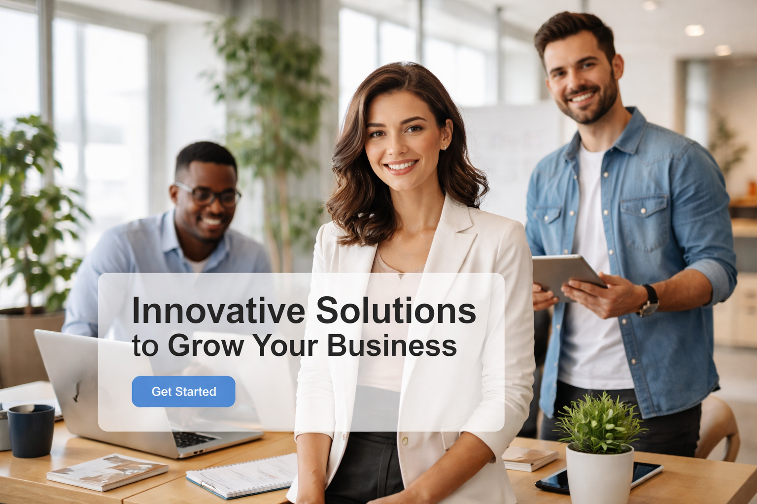 Professional team of IT consultants working with modern technology in a sleek corporate office environment